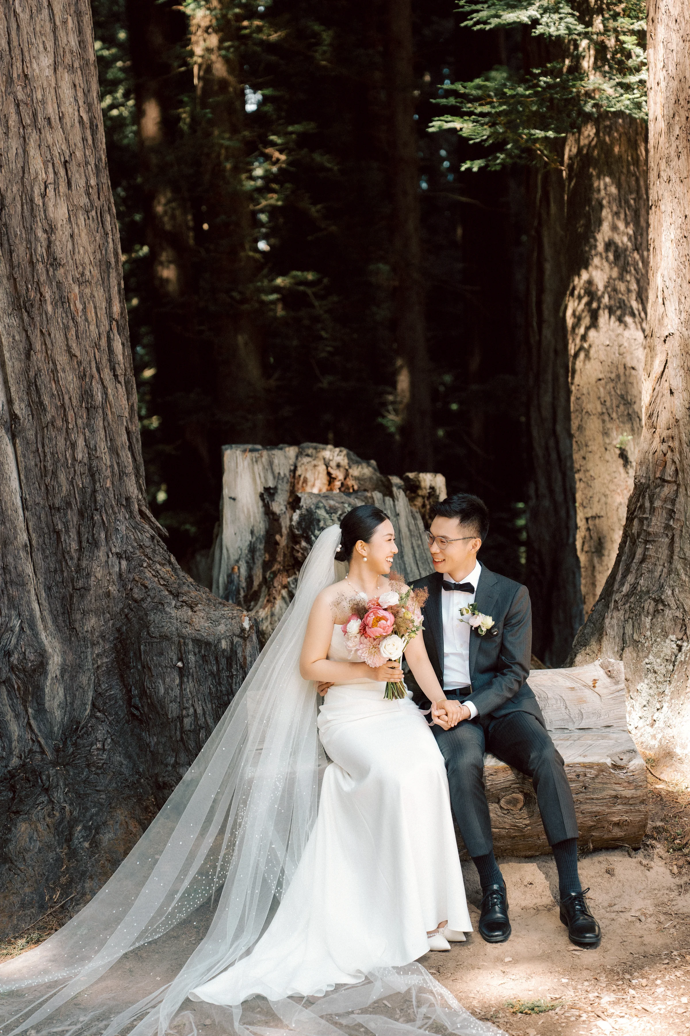 Couple making a heart shape with their hands in a close portrait